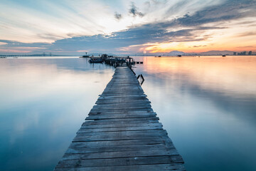 Fototapeta na wymiar Real wooden bridge view of sunrise background