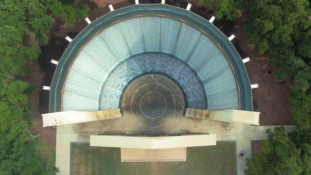 Aerial: Gerald D. Hines Waterwall Park. A 64-ft.-tall fountain circulating 11,000 gallons of water every minute. Houston, Texas, USA