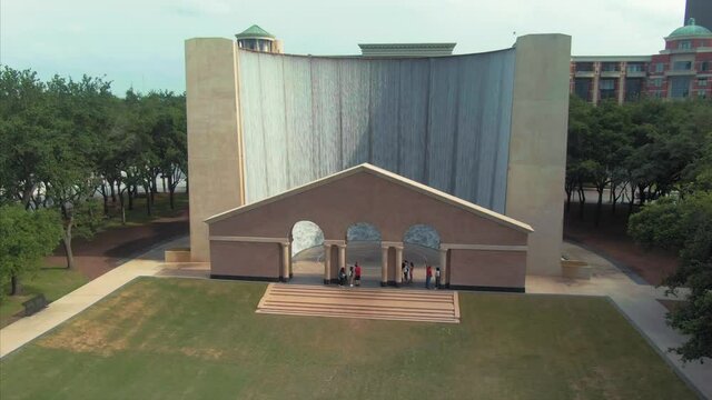Aerial: Gerald D. Hines Waterwall Park. A 64-ft.-tall fountain circulating 11,000 gallons of water every minute. Houston, Texas, USA