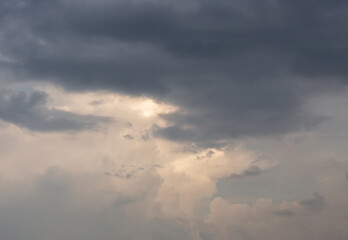 Naklejka na ściany i meble Background of dark clouds before a thunder-storm