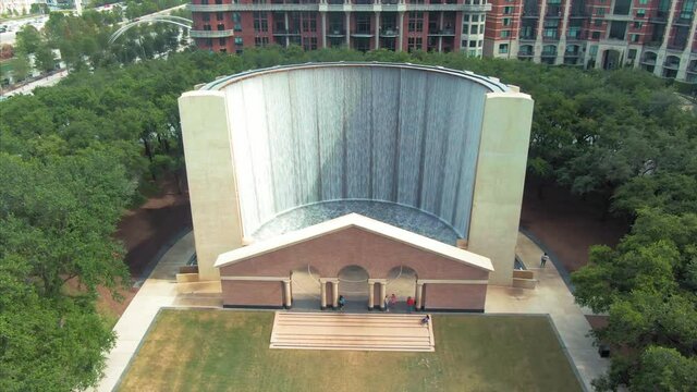 Aerial: Gerald D. Hines Waterwall Park. A 64-ft.-tall fountain circulating 11,000 gallons of water every minute. Houston, Texas, USA