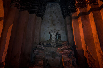 Old Buddha statue in Wat Chai Wattanaram temple in Ayutthaya Historical Park