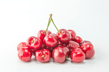 Obraz na płótnie Canvas Red cherry on white background