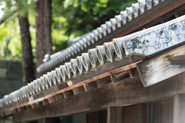 Traditional Japanese roof decoration with round tiles