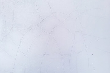 Cracked white wall background texture