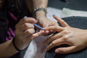Obraz na płótnie Canvas professional manicure, manicurist, beauty salon
