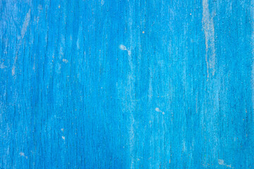 Background of faded old blue painted wooden boards.