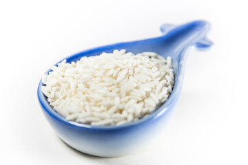 Raw glutinous sticky rice in a white isolated background