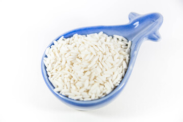 Raw glutinous sticky rice in a white isolated background
