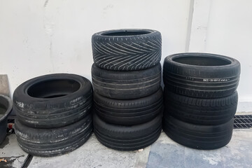 Obraz premium Stack pile of old tire on ground