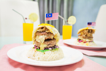 Multi layer burger view in close with Malaysia Flag on top