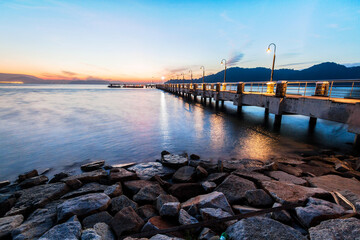 Fototapeta na wymiar Jerejak Pier view during sunrise by the shore of Bayan Mutiara