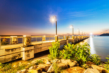 Jerejak Pier view during sunrise by the shore of Bayan Mutiara