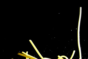 Close up of pasta on black background