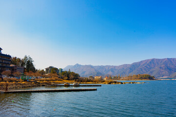 Naklejka premium Lake Yamanaka It is the largest lake in the area of Mount Fuji. Located in Yamanashi Prefecture Suitable for activities such as boating, fishing, water skiing, surfing, swimming, and viewing Mt. Fuji.