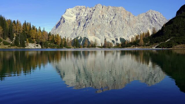Perfect alpine lake with mountain reflection in Autumn. Seebensee, a lake in Austria with a view of Zugspitze in the alps