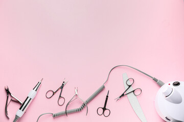Supplies for manicure on color background