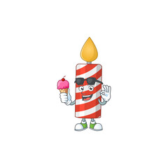 Happy face of candle cartoon mascot having an ice cream