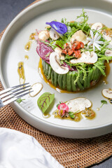 Exquisite dish. Beautifully decorated healthy organic food. Modern creative restaurant meal. 
