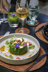 Exquisite dish. Beautifully decorated healthy organic food. Modern creative restaurant meal. 
