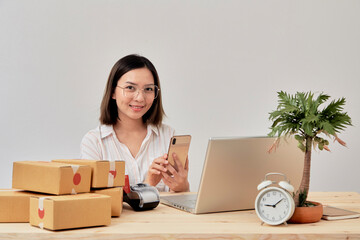 Young woman online seller working from home