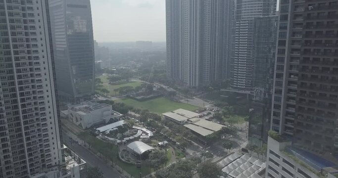 Ungraded, Forward aerial flight over local street market, arts centre and amphitheater in business district area. Drone, 4K. 