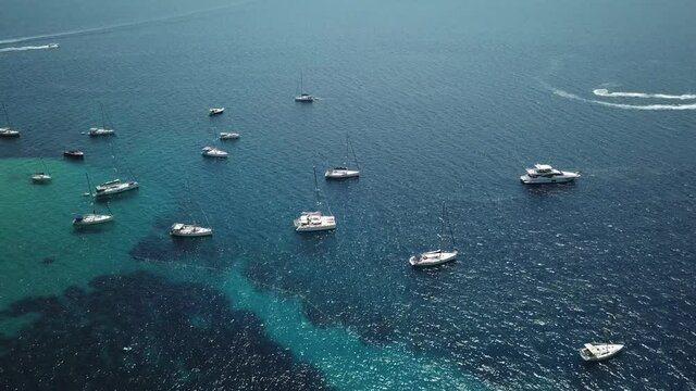 Brac Island, Croatia. Drone Aerial View of Boats and Jet Ski Watercrafts in Adriatic Sea Water