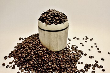 coffee beans in a small keg