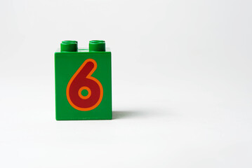 the number six written on the block from the children's constructor