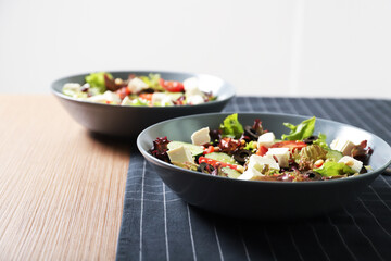 Tasty greek salad with fresh vegetables in a plate.