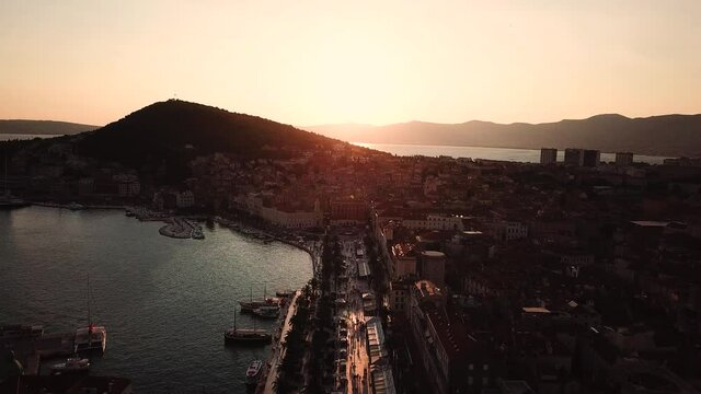 Split, Croatia. Drone Aerial View of Sunset Above Riva Boardwalk, Adriatic Sea and Marjan Hill Silhouette