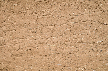 Old clay plaster on wall closeup