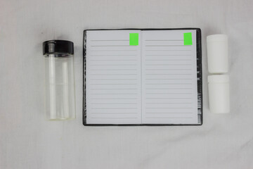 Top view of the workspace with some office supplies isolated white background. Top view with copy...