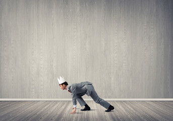 King businessman in elegant suit running in empty room