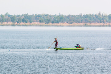 Naklejka premium Villagers fishing in Nong Han, Sakon Nakhon, Thailand
