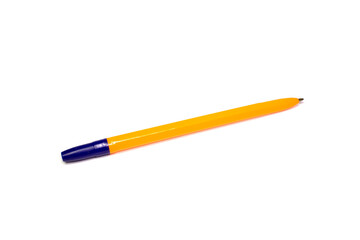 orange blue ballpoint pen with blue paste rests on a white background.