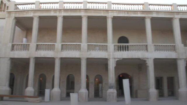Bahrain Shots - Panning ltr over old building courtyard