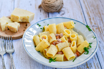 Home made italian  carbonara pasta with parmesan  cheese