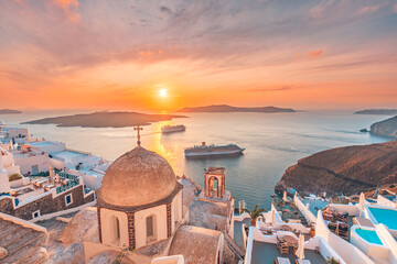 Amazing evening view of Santorini island. Picturesque spring sunset on the famous Greek resort...