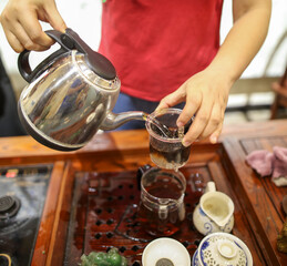 Obraz na płótnie Canvas Brewing Chinese tea from the tea leaves.