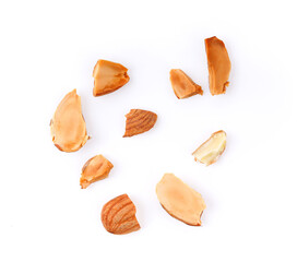 Pieces of almonds on white background