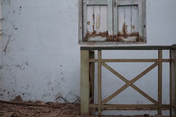 old wooden window with shutters