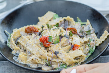 Mafaldine pasta with cherry tomatoes