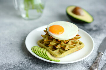 Fresh delicious and nutritious breakfast with waffles with spinach