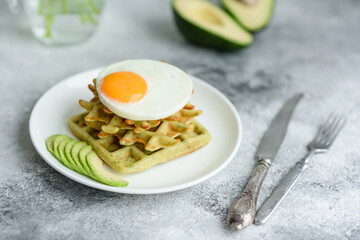 Fresh delicious and nutritious breakfast with waffles with spinach