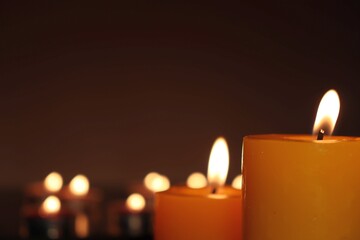 Candle black background of mourning funeral moment of silence