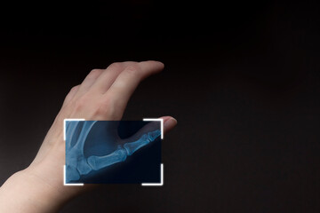 partial x-ray of hand on brown background, scanning hand, futuristic technology with biometric. Cyber security network.