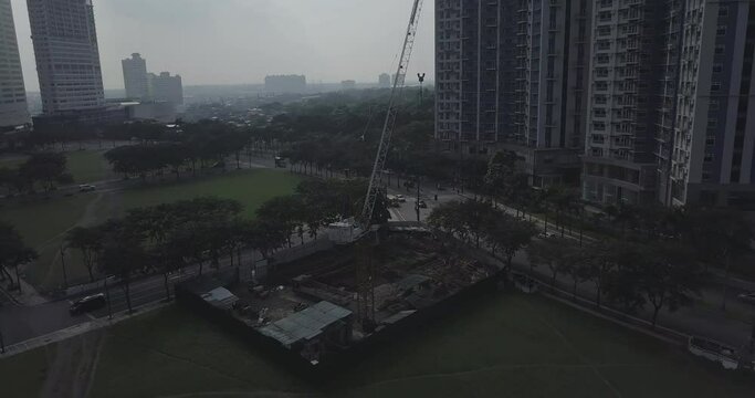 Ungraded, Panel aerial flight over construction site.  Crane close up. Drone, 4K. 
