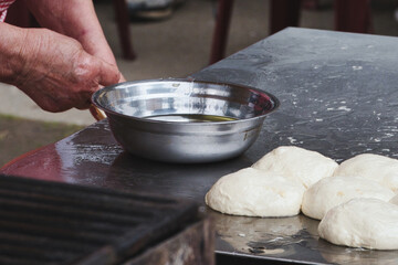 chef preparing dough for baking
