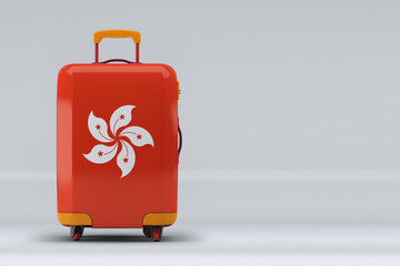 Hong Kong national flag on a stylish suitcases on color background. Space for text. International travel and tourism concept. 3D rendering.
